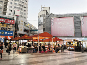 昆明引摊入市摊位，城市新活力之源